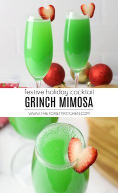 two glasses filled with green liquid and strawberries on the rim, sitting next to each other