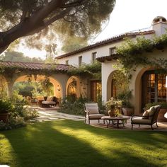 an outdoor living area with chairs and tables