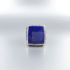 Classic and modern square cabochon blue Lapis Lazuli ring with Sterling silver. Unique gift for her or him, friend, girlfriend, wife, boyfriend, man September and December birthstone, 9 yeaar anniversary. The beautiful royal blue Lapis Lazuli is cut as a classic cabochon and set in Sterling silver with small dots of silver and 18k gold. All our stones are natural stones and our jewelry is handmade, very slight differences may occur in color and size. Our inlay work is all natural stone, NOT pres Rectangular Lapis Lazuli Jewelry As Gift, Luxury Lapis Lazuli Gift Ring, Blue Lapis Lazuli Signet Ring With Gemstone, Blue Lapis Lazuli Gemstone Signet Ring, Luxury Cabochon Lapis Lazuli Rings, Friend Girlfriend, Malachite Rings, Blue Lapis Lazuli, Lapis Lazuli Ring