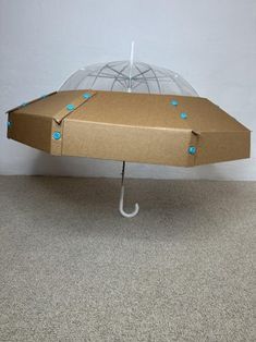 an open umbrella sitting on top of a floor