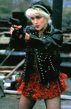 Trend setter: One of Madonna's iconic 80's looks in as Nikki Finn in the hit 1987 movie, Who's that Girl Madonna Fashion, Madonna Looks, Madonna Photos, Lady Madonna