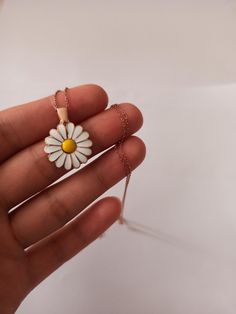 Color: silver , gold Chain: .45 cm Pendant size: 1.8cm / 1.8cm Material: 925 Sterling Silver 925 sterling small daisy necklace will look very elegant on your neck. We can open it and write any name, word or word you want into it. 925 sterling tiny daisy pendant provides a very elegant and nice look on your neck It will enchant you with its elegance. It provides very comfortable use in your daily life. It can be a great gift to your loved ones. birthdays, anniversaries, Valentine's day or even Ch Cute Flower Shaped Jewelry For Gifts, Cute Flower Shaped Jewelry Gift, Cute Flower-shaped Jewelry For Gifts, Cute Flower Pendant Jewelry Gift, Cute Flower Shaped Necklace For Gifts, Cute Flower Necklace For Gift, White Flower Pendant Necklaces For Gifts, Cute Flower Shaped Necklaces For Gifts, White Dainty Flower Necklace As Gift For Her