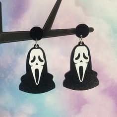 Ghost Earrings - Halloween jewelry - Horror Earrings - Halloween earrings The perfect earrings for the horror movie lover! Makes a great gift idea too. Comes with both plastic/metal backings and silicone rubber backings Earring card included Stay festive all year round with these amazing Halloween earrings! Earring lengths (with post) are: 2 5/8" 2. 5mm thick acrylic with print Earring posts are 1/2" wide and 1/2" long Jumper hoops are 8mm *Check out my other listings! *Custom orders welcome **Charms and earring posts are from China** Novelty Drop Earrings For Halloween, Edgy Halloween Drop Earrings, Punk Halloween Drop Earrings, Nickel-free Punk Halloween Earrings, Horror Earrings, Novelty Black Halloween Earrings, Ghost Earrings, Acrylic Jewellery, Movie Lover