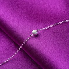 Show off your pedicure and add touch of light-catching shine to your ensemble with this elegant anklet plated in gleaming sterling silver. 0.39'' W x 9.84'' L S-hook clasp Fine silver-plated copper Elegant Anklet, Bead Anklet, Charm Anklet, Cross Chain, S Hook, Beaded Anklets, Beads Bracelet, Small Accessories, Fine Silver