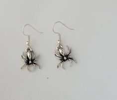 "* Spider earrings perfect for a Halloween costume accessory jewellery gift. These spooky Gothic Halloween creepy spider earrings. * Reverse of the earring can be seen in picture 3.  * Animal earrings are handcrafted to order and can be customised to buyers' preference. Please note that you have a choice of silver tone or sterling silver hooks. Picture 6 shows the silver tone hooks as numbered 2, 3 and 4, while the sterling silver hooks are numbered 1, 5, 6 and 7. If you select the sterling silv Spooky Silver Dangle Earrings, Spooky Silver Earrings For Gift, Cosmo Und Wanda, Halloween Mode, Halloween Costume Jewelry, Creepy Spider, Earrings Gothic, Halloween Creepy, Spider Earrings