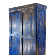 an old blue painted wooden armoire