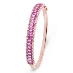 Gorgeous Bangle Bracelet Featuring 25 Natural Oval Pink Sapphires Set Into Four-Prong Setting. The Pink Sapphires Are Surrounded For 164 Round Cut Diamonds Set Into Pave- Setting. All Set In A 14KT Rose Gold. This Item Is Made-To-Order. Please Allow Up To 10 Business Days To Make It. Pink Gold Formal Fine Jewelry Bracelets, Pink Gold Formal Bangle Jewelry, Elegant Rose Gold Bracelet For Formal Occasions, Formal Pink Gold Bangle Jewelry, Elegant Pink Gold Bracelet For Formal Occasions, Formal Pink Gold Bangle, Formal Pink Gold Bracelet, Elegant Pink Diamond Bangle Bracelet, Elegant Pink Gold Round Bracelet