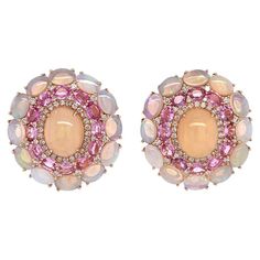 18K Rose Gold Ethiopian Opal: 10.71ct total weight. Pink Sapphire: 4.37ct total weight. Diamonds: 0.87ct total weight. All diamonds are G-H/SI stones. Sapphire And Diamond Earrings, Gold Clips, Jewelry Clothes, Jewel Box, Sapphire Diamond, Pink Sapphire, Jewelry Vintage, Ethiopian Opal, 18k Rose Gold