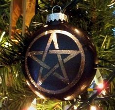 an ornament hanging from a christmas tree