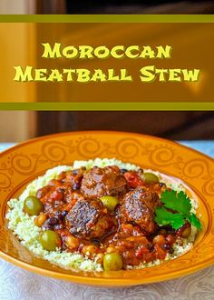 moroccan meatball stew on top of rice in an orange bowl with green garnish