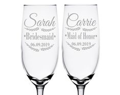 two wine glasses with the words mr and mrs engraved on each glass, one is empty