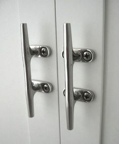 two white doors with chrome handles and knobs