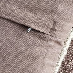 close up view of the pocket on a pair of pants