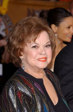 an older woman with bright orange lipstick on her lips at the screen actors'awards