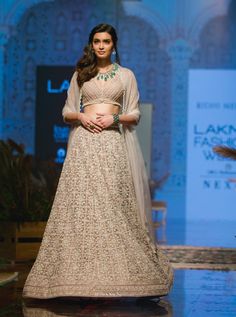 Ridhi Mehra - Champagne & Ivory Lehenga Set - INDIASPOPUP.COM Champagne Lehenga, Beige Lehenga, Ivory Lehenga, Ridhi Mehra, Net Blouses, Embroidered Crop Tops, Lehenga Skirt, Lehenga Blouse, Elegant Sets