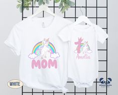 Looking for that Birthday shirt either for a party or as a gift? Look no further than the Bella +Canvas Birthday shirts with our unique design, perfect for your unicorn birthday party theme  The Adult Shirts are the Bella Canvas Unisex premium t-shirt which feel soft, and light with just the right amount of stretch. This is complimented by the Baby Shirt, the Bella Canvas One Piece which is great for the little a baby's comfort. This one piece is the right choice for all active babies. The envelope neckline and three snap leg closure ensure comfort throughout the day. For the slightly older little one, the Toddler Bella Canvas Tee with its light and soft ring-spun cotton is just what's needed for the ever-moving toddlers!  The Youth Staple Bella Canvas Tee completes the set for the for the White Unicorn Print Crew Neck Top, White Unicorn Print T-shirt For Summer, Cotton Unicorn Print Top For Birthday, Summer White T-shirt With Unicorn Print, Fun Unicorn Print Tops For Birthday, Fun Unicorn Print Top For Birthday, Cute White T-shirt With Unicorn Print, White Unicorn Print T-shirt For Birthday, Birthday White T-shirt With Unicorn Print