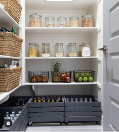 an organized pantry with lots of food in baskets and containers on the shelves next to each other