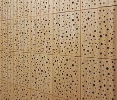 the wall is lined with holes in it