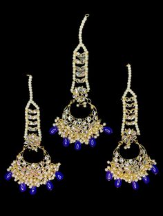 This simple and lightweight but gorgeous tikka and matching earrings set comes in beautiful kundan work with gold finish and blue beads. It is traditional yet modern and can be paired with any festive outfit! Luxury Festive Tikka For Diwali, Luxury Meenakari Tikka For Festive Season, Luxury Hand Set Tikka For Festivals, Luxury Tikka For Diwali Festive, Luxury Elegant Tikka For Festivals, Wedding Pakistani, Kundan Work, Maang Tikka, Pakistani Jewelry