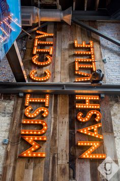 the marquee sign is lit up and ready to be used as an advertisement