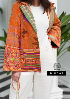 Hand crafted TOPS at DIPDAZ SETS Discover the perfect blend of tradition and contemporary fashion with our Afghan Modern Style Handmade Collared Top. This exquisite piece is a testament to the rich cultural heritage of Afghanistan, meticulously crafted by skilled artisans to bring you an authentic and stylish garment. Features: Handmade Excellence: Each top is handcrafted with attention to detail, ensuring a unique and high-quality piece.  Modern Design: The top features a modern silhouette with Bohemian Sets With Woven Motifs For Festive Season, Bohemian Festive Sets With Woven Motifs, Festive Bohemian Sets With Woven Motifs, Traditional Fitted Dupatta For Spring, Bohemian Orange Long Sleeve Sets, Festive Bohemian Kurta With Woven Motifs, Bohemian Traditional Wear For Ceremonies, Fitted Bohemian Traditional Wear, Bohemian Traditional Wear With Woven Motifs For Festive Season