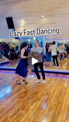 a group of people dancing on a wooden floor with the words lazy fast dancing in front of them