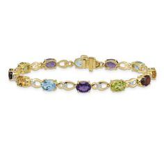 14K Two-tone Gold with rhodium over 14k yellow gold 9.000 cttw rainbow gemstone and diamond bracelet. Measures approximately 3/16 of an inch in width and has a box catch closure. Heirloom Multicolor Oval Jewelry, Yellow Gold Multi-stone Oval Bracelets, Yellow Gold Oval Bracelet With Multi-stone, Yellow Gold Multi-stone Oval Bracelet, Yellow Gold Oval Multi-stone Bracelet, Elegant Rainbow Round Bracelets, Multi-stone Round Diamond Bracelet For Anniversary, Elegant Rainbow Diamond Jewelry, Elegant Rainbow Cubic Zirconia Jewelry