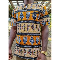 Our African Mma Print Short Sleeve Hidden Button Shirt Is An Essential Piece For Men. It Is Perfect For The Modern Man Who Enjoys Elevating His African Wardrobe. This Very Stylish Piece Can Be Worn With Jeans Or Slacks To Bring Out The Look. Versatility Of The Design Goes With Any Style Of Wear. Description: Short Sleeved Shirt Hidden Front Pocket 100% African Wax Print Designed In The Usa, Imported From Ghana, West African Care Instructions: Dry Clean Only. Do Not Bleach. Iron Inside Out. Xhosa Shirts For Men, Hidden Button Shirt, African Print Shirt, African Wax Print, Wax Print, Modern Man, Button Shirt, Print Shirt, Mens Shirt Dress