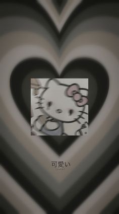 an image of a heart with hello kitty on it's face in the center