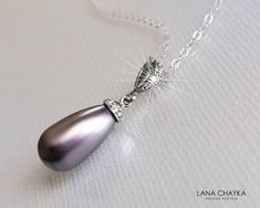 Wedding Mauve Light Purple Lilac Teardrop Pearl Pendant Necklace with .925 Sterling Silver Chain. PLEASE READ ITEM DESCRIPTION and SHOP POLICIES before placing your order, and contact me with any questions! CHAIN is 18 inches (45.7cm) long. PENDANT is about 1.06 inch (2.7cm) long including bail. MATCHING EARRINGS (Pic.#7): https://www.etsy.com/listing/1269024687/mauve-pearl-earrings-wedding-lilac?click_key=4b785c4b6e052c32fd284c98a390438aac37d31a%3A1269024687&click_sum=4e422ba8&ref=shop_home_act Classic Silver Drop Bridal Necklace, Silver Drop Bridal Necklace Gift, Silver Drop Bridal Necklace As Gift, Formal Silver Bridal Necklace Pear Shaped, Silver Pear-shaped Bridal Necklace For Formal Occasions, Formal Silver Pear-shaped Bridal Necklace, Silver Teardrop Bridal Necklace With Elegant Design, Silver Drop Bridal Necklace For Formal Occasions, Silver Bridal Necklace With Teardrop Elegant Design