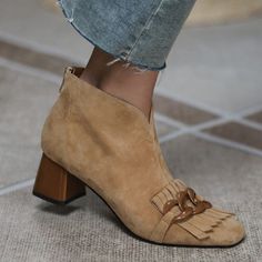 Step out in style with these Marcie Vintage Fringed Buckle Suede Ankle Boots! These handcrafted beauties feature a distinct fringed design with buckle accents, so you can make a statement wherever you go. Plus, with two lining options available - regular or short plush for winter, you'll be sure to find one that's just right for you! Time to show off your shoes-nal taste. Gender: WOMEN Item Type: Boots, Ankle Boots Upper Material: Kid Suede Lining: Genuine Leather, Short Plush Toe Shape: round t Mid Heel Ankle Boots, Nude Boots, Zipper Fashion, Office Shoes Women, Fringe Ankle Boots, Zippers Fashion, Lady Shoes, Fashion Office, Casual Chique