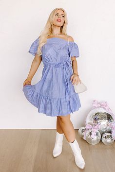 Plus Size - You are sure to look simply supreme in this stunning sky blue dress featuring lightweight breezy material patterned with white accent stripes, a straight elastic neckline with short sleeves that can be worn on or off the shoulder, a tie belt waistline, and a flattering silhouette that falls into a peplum bottom with an uneven knee-length hemline! Measurements 1XL : Bust 36", Hip 40", Length 34", Sleeve Length 7.5", Waist 28-32". 2XL : Bust 38", Hip 42", Length 34.5", Sleeve Length 8" Blue Off-shoulder Casual Dress For Vacation, Blue Off Shoulder Dress For Summer Day Out, Summer Off Shoulder Short Sleeve Dress, Blue Off-shoulder Dress For Summer Day Out, Summer Off-shoulder Dress With Short Sleeves, Blue Off-shoulder Dress For A Summer Day Out, Casual Blue Off-shoulder Dress For Day Out, Spring Vacation Off Shoulder Dress With Short Sleeves, Casual Blue Off Shoulder Dress For Spring