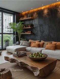 a living room filled with furniture next to a large window and a wooden coffee table