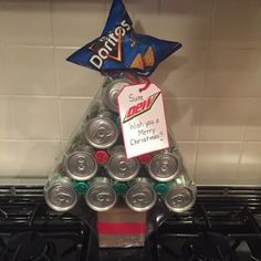 a christmas tree made out of soda cans