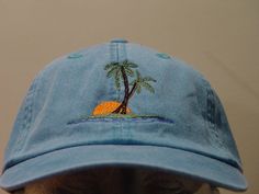 NEW EMBROIDERED PALM TREE SUNSET OCEAN WILDLIFE BASEBALL HAT (HATS PICTURED ARE CARIBBEAN BLUE, NAVY BLUE, KHAKI, WHITE, BURGUNDY AND CHARCOAL) Adams Optimum 6 Panel Baseball Hat Low Profile - 100% Cotton Twill Adult Cap Pigment Dyed - Garment Washed Hat 6 Panels with Sewn Matching Eyelet Visor with 3 Rows of Stitching Pre-formed Bill - Leather Strap with Brass Grommet Adjustable - One Size Fits Most An Extremely Comfortable Baseball Hat! Enjoy the Embroidered Palm Tree Sunset Ocean Wildlife Hat Six-panel Baseball Cap For Beach And Summer, Embroidered Baseball Cap For Beach, Casual Beach Hats With Embroidered Logo, Casual Beach Hat With Embroidered Logo, Adjustable Beach Baseball Cap With Embroidered Logo, Adjustable Embroidered Baseball Cap For The Beach, Casual Embroidered Hats For The Beach, Casual Six-panel Hat With Embroidered Patch, Casual Embroidered Beach Hats