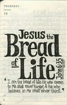 an open notebook with the words jesus the bread of life written in black on it