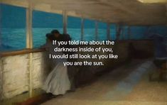 a man and woman are kissing on a balcony overlooking the ocean with a quote written below