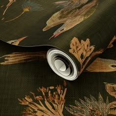 an image of a wallpaper with flowers and leaves on the background in shades of green