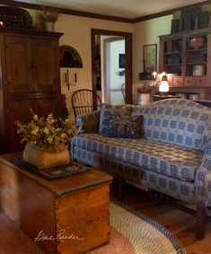 a living room filled with furniture and wooden floors