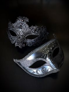 The men's Venetian mask features black glitter around the eyes, casting a spell of mystery and sophistication. For the ladies who embrace elegance with a touch of sparkle, our women's mask is adorned with gems. This luxurious mask set is ideal for masquerade balls, weddings, or any special occasion!


Age Group/Gender - Adult/Unisex

Size/Type - One size fits all adults

Mask Color - Black

Mask Material - Resin/Fabric

Accent Material - Glitter Black Full Face Carnival Masks, Black Full Face Masks For Carnival, Gothic Full Face Mask For Masquerade, Gothic Full Face Masquerade Masks, Full Face Black Masquerade Mask For Costume Party, Black Full Face Masquerade Mask For Costume, Black Eye Mask For Masquerade, Full Face Black Masquerade Mask For Costume, Gothic Style Masquerade Eye Mask