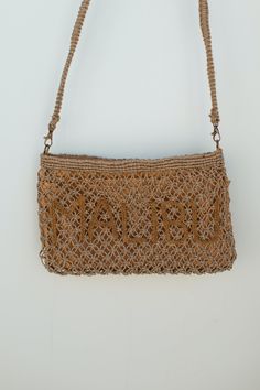 Pack your beach essentials in this stylish Malibu Crossbody Clutch! Crafted from woven jute, it features an inner pocket to stash your essentials with ease, and a long strap for extra comfort. Plus, its beachy tones give the perfect coastal touch to any summer outfit. The Cali Collection DETAILS Zipper Handbag Removable Strap 12" Long, 8" Wide Strap: 46" Pocket Inside Casual Woven Sand-colored Beach Bag, Casual Sand-colored Woven Crochet Bag, Casual Sand Colored Woven Crochet Bag, Casual Sand-colored Crochet Woven Bag, Casual Sand-colored Jute Beach Bag, Beachy Sand-colored Woven Beach Bag, Beachy Crochet Bag With Adjustable Strap, Beachy Brown Jute Beach Bag, Adjustable Strap Jute Beach Bag