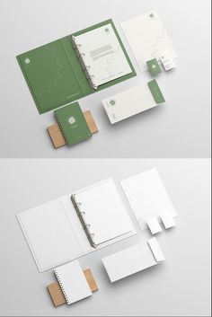 various stationery items are arranged on top of each other, including notebooks and papers