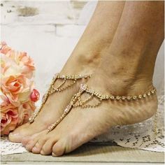 Something special and pink for your dream wedding. Our elegant gold and pink rhinestone barefoot sandals are striking for your dream beach wedding. Tradition inspired these stunning rhinestone barefoot sandals. A Catherine Cole Studio handmade sandal exclusive. perfect for that special event. They simply make your tootsies look glamorous on your wedding day! one size fits 6-12, sold in pairs The chain extender is extra long, I suggest trimming chain to fit your ankle. May I suggest our clear ver Adjustable Gold Barefoot Sandals As Gift, Gold Barefoot Sandals For Summer Gift, Gold Barefoot Sandals For Party, Elegant Gold Barefoot Sandals For Summer, Elegant Adjustable Gold Barefoot Sandals, Adjustable Open Toe Gold Barefoot Sandals, Gold Anklets With Beads For Summer, Adjustable Gold Barefoot Sandals For Wedding, Gold Toe Ring Barefoot Sandals