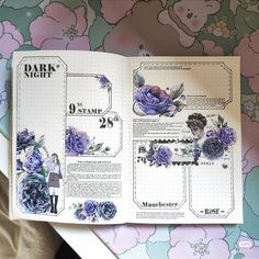 an open planner with flowers on it