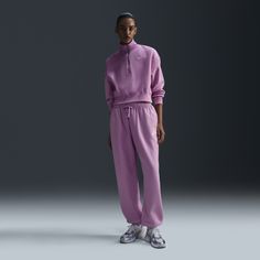 Soft and warm, these oversized Club Fleece sweatpants are perfect for days when comfort is everything. Loose through the hip and thigh, the leg is finished with an elasticated cuff at the ankle for a perfectly cinched-in look. Athleisure Tracksuit With Elastic Waistband For Winter, Winter Athleisure Tracksuit With Elastic Waistband, Nike Winter Leisure Sweats, Nike Fleece Sweatpants With Ribbed Cuffs, Nike Fleece Sweats For Leisure, Nike Sweatpants With Relaxed Fit For Sportswear, Nike Sweatpants Relaxed Fit Sportswear, Nike Relaxed Fit Sweatpants, Relaxed Fit Nike Joggers For Loungewear