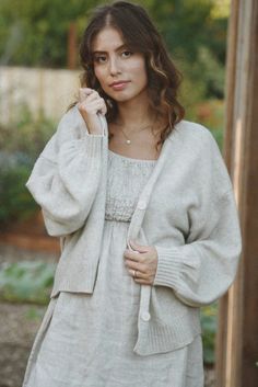 Style // Whether you call it beige, cream, or off-white... one thing is for sure - our Moon tone is absolutely perfect!  Lovely as a layer, or simply styled solo. Just as stunning as it is cozy, this goes-with-anything knit cardigan is the perfect fit with an oversized silhouette featuring three buttons. Made from an e Beige Cashmere Sweater Coat For Spring, Casual Beige Cashmere Sweater Coat, Chic Beige Sweater Coat For Layering, Elegant Everyday Beige Cardigan, Chic Everyday Cardigan In Soft Knit, Chic Soft Knit Everyday Cardigan, Chic Cream Cardigan For Layering, Chic Everyday Soft Knit Cardigan, Beige Sweater Coat For Layering