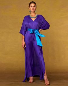 Crafted from beautifully draping silk, our Alessandra Belted Silk Kaftan feels incredibly sensuous and soft. A subtle sheen highlights the flutter of every movement. A most sumptuous yet restrained statement sure to wow at any black tie event. The rich purple of the Alessandra Belted Kaftan is a true royal purple—the one with deep blue undertones perfected by the Phoenicians millennia ago. It was a dye so rare and precious that only royalty could wear it, from Cyrus the Great of Persian to ... Royal Blue Belt, Aladdin Costume, Cyrus The Great, Purple Belt, Short Kaftan, Casual Luxe, Blue Belt, Silk Kaftan, Rich Purple