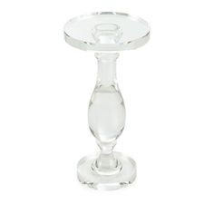 an empty glass candle holder on a white background