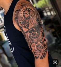 a man with a tattoo on his arm has a lion and rose in front of him