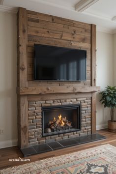 a fireplace with a flat screen tv mounted on it's wall above the fire place